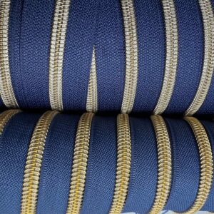 Antique Gold #5 Nylon Coil Teeth on Navy Zipper Tape